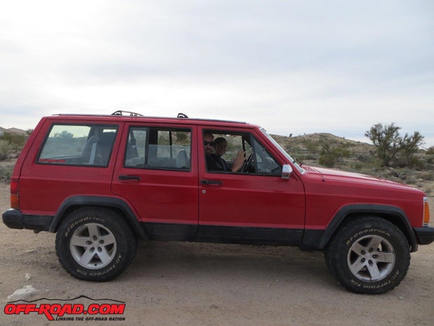 Although this isnt stock heightsome previous owner had installed a cheap 2-inch lift at some time in the XJs 25-year historythe Rubicon wheels and tires are already on the Jeep.