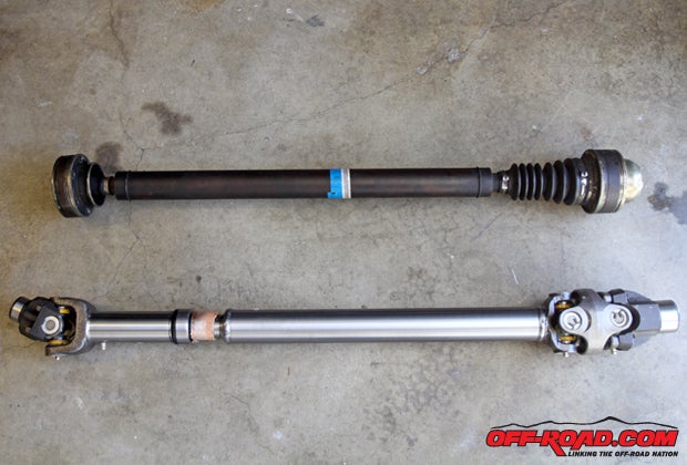 The rezeppa-rezeppa-style stock driveshaft (top) comes off fairly easily. Well be replacing it with a new Tom Woods double-cardan-style front drive shaft. 