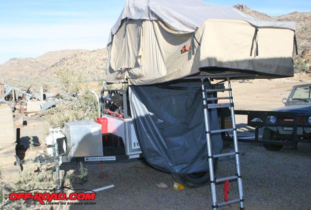 The ladder also supports half the tents floor, so you need to adjust its height and angle.