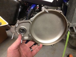 They spared no expense with this engine. This is the smaller Billet Titanium side cover and below it titanium clutch cover. Ka-ching
