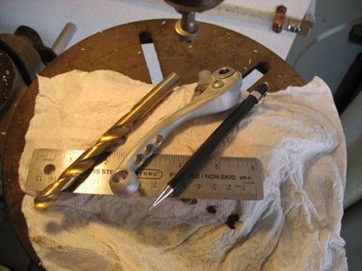 Levers were drilled for aesthetics and improved grip.