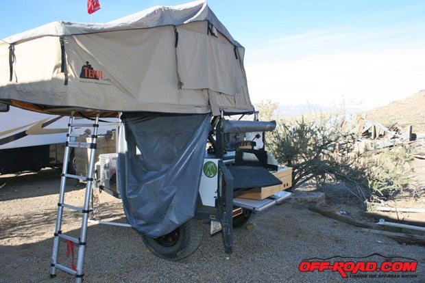 Extending over the ladder is an included awning to keep dew and rain off the ladder, but theres no floor in the awning. The optional annex connects to the tents platform with the same heavy-duty zipper that holds the cover down during travels.