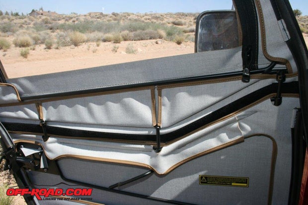 Once the half-doors are adjusted and fit, slip the three rods on the upper window half into their matching slots. There are adjustable collars on the two outer rods of each window, use them to adjust the mating of the window to the half door.