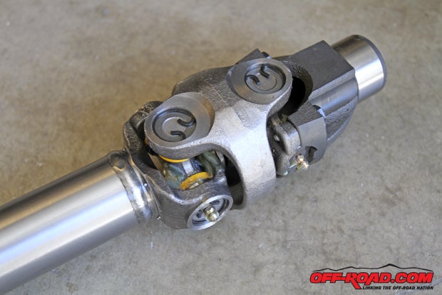 Since our new double-cardan drive shaft from Tom Wood features two universal joints on the transfer case side, its movement and adjustment during off-road driving will help make sure our WJ has proper alignment and that our driveline isnt putting adding stress on the front differential or the transfer case. Were also pleased to see the u-joints are greasable as well to maintain the life of the joints.