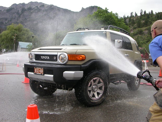 The Ouray fire department teams up with the high school girl's volleyball team to wash trucks at the end of the week.