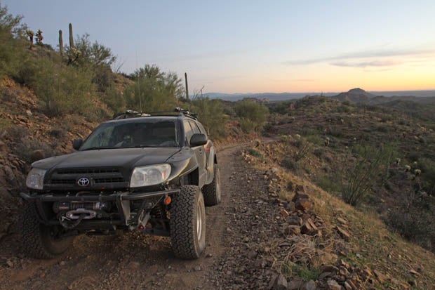 The narrow shelf road offered expansive views. Wed cut our trip short but were rewarded with a classic Sonoran sunset.