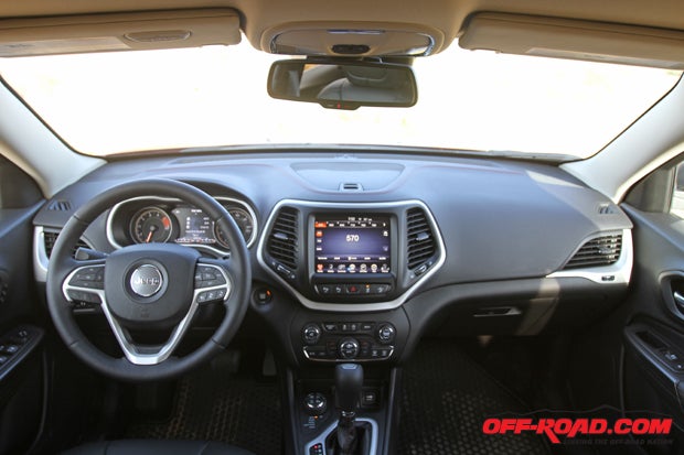 The Cherokee Trailhawk features a 7-inch touchscreen at the center of the dash, and the driver is treated to a heater leather steering wheel.