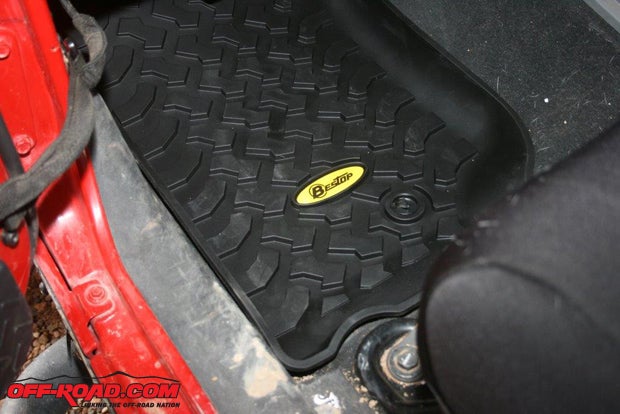 Replace your OEM floor mats with Bestops tough, thick, embossed rubber liners. With over 50,000 miles on my JKs clock, my right foot had already worn a hole through my Jeeps floor mat and the carpet underneath.