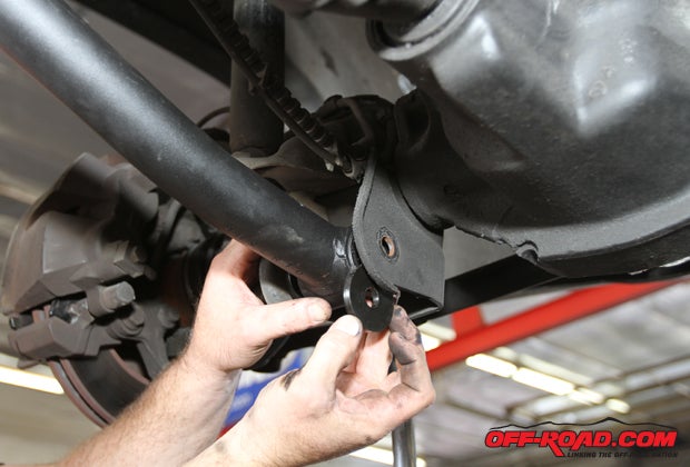 The 1/4-inch control arm spacers go on each side of the control arm bushing, while the 1/8inch spacers go at the frame mount. 
