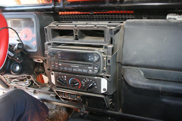 Since the turn-of-the-century models, there are few locations on a Jeep's dash for switches, so we chose the blank panels adjacent to the locker and overdrive switches.