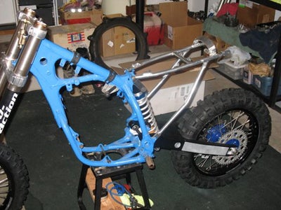 An aluminum sub frame is mated to the stock frame.