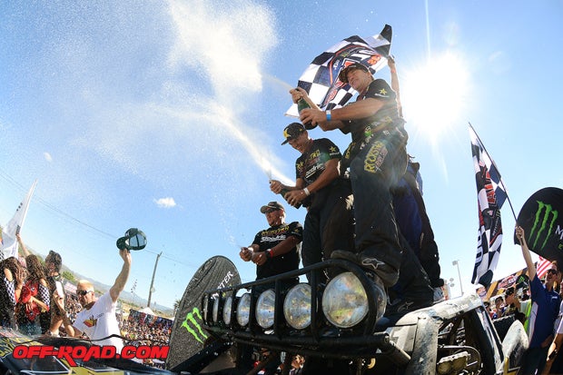 Rob MacCachren and team celebrate their Baja 1000 overall victory in La Paz.