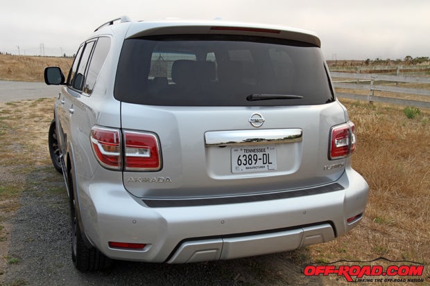The full-size Armada SUV features a rounded rear profile.